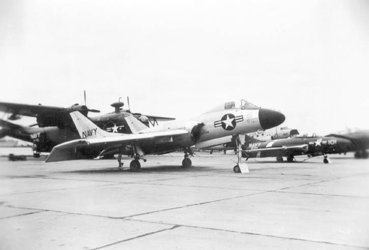 Chance Vought F7U Cutlass, s/n 128466,  Grumman F6F-5 Cougar of VF-24, Grumman TBF Avenger,  Douglas R4D (Navy version of the DC-3) and a rare Martin PBM-5A Mariner on display at an airshow in the early 1950s.